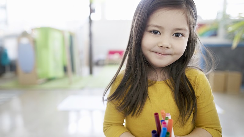 Early care in Billings, young girl in yellow shirt, 3 column