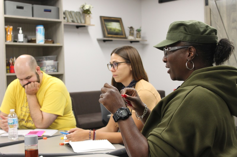 A guest council meeting at People Serving People, 3 column