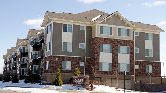 Once opposed by many neighbors, the Carver Crossing apartment complex in Carver, Minn., has become an accepted part of the community.
