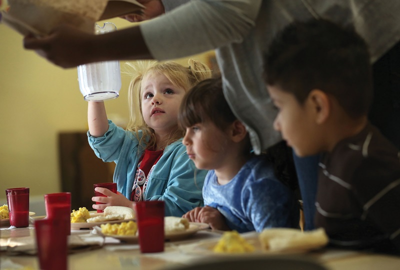 Children eating in a school cafeteria