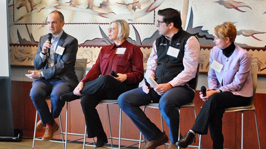 A panel of four property developers and city planners speaks at the Minneapolis Fed's February 14 event on surburban land use and multifamily housing.