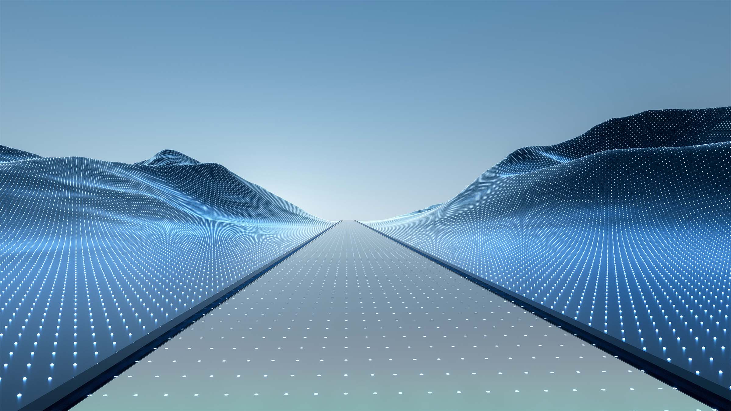 In an abstract, computer-generated landscape of wave- or mountain-like structures, a path cuts straight down the middle, from the foreground to a bright area on the horizon. The image is shaded in blue, and a matrix of illuminated dots covers all the surfaces.