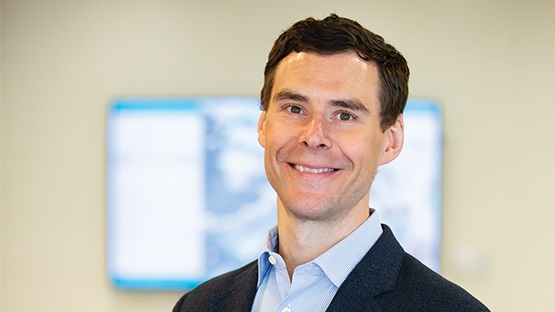 Portrait photo of smiling man - Nathan Hendren