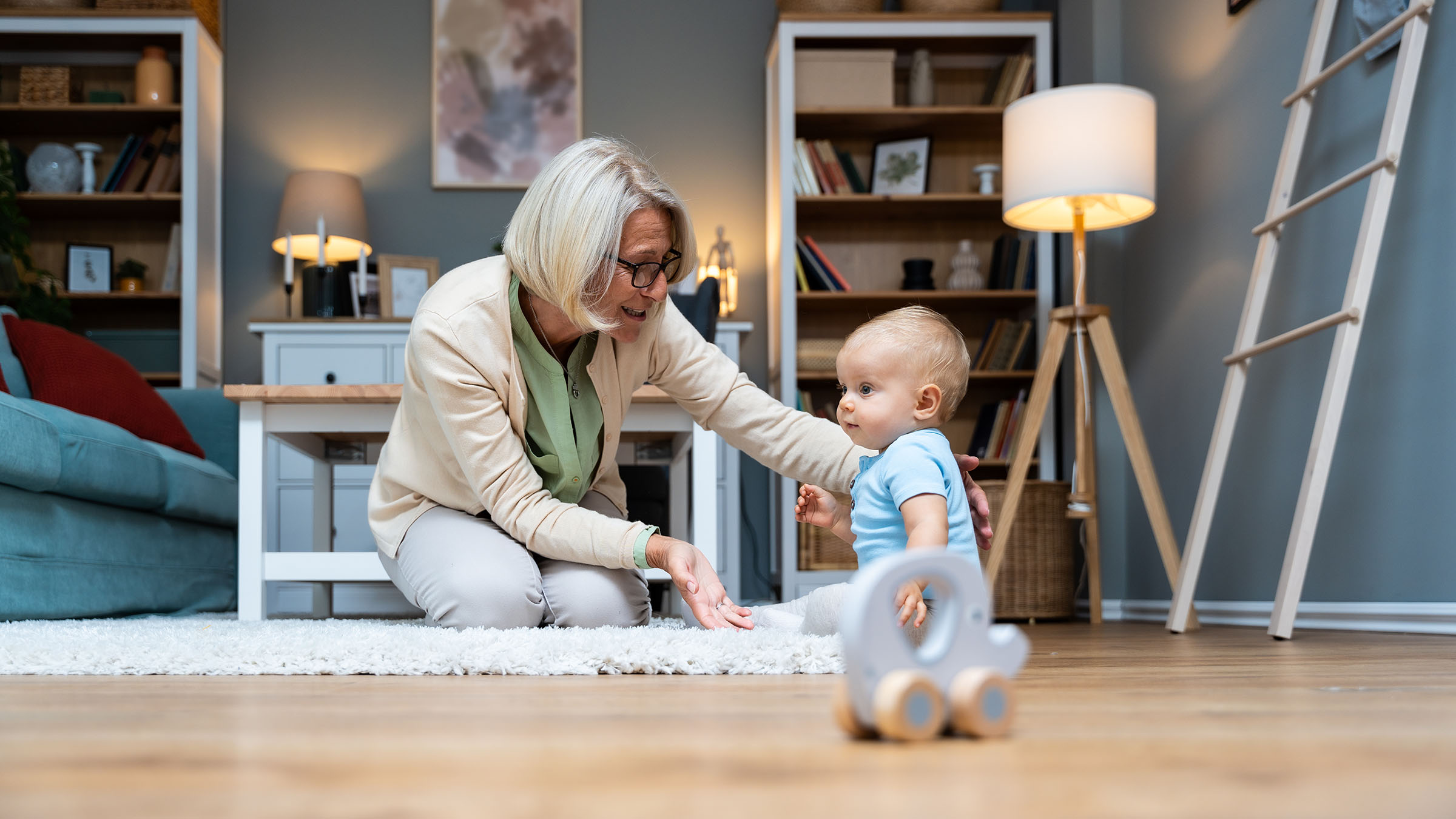 Grandmother taking care of her grandchild while his parents working