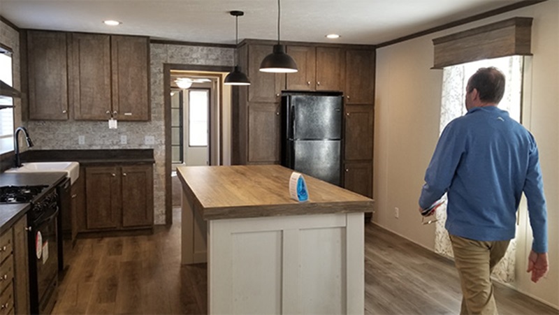 Tim Schroeder of Urban Grove in St. Anthony, Minnesota shows a new, 1,200-square-foot manufactured home.