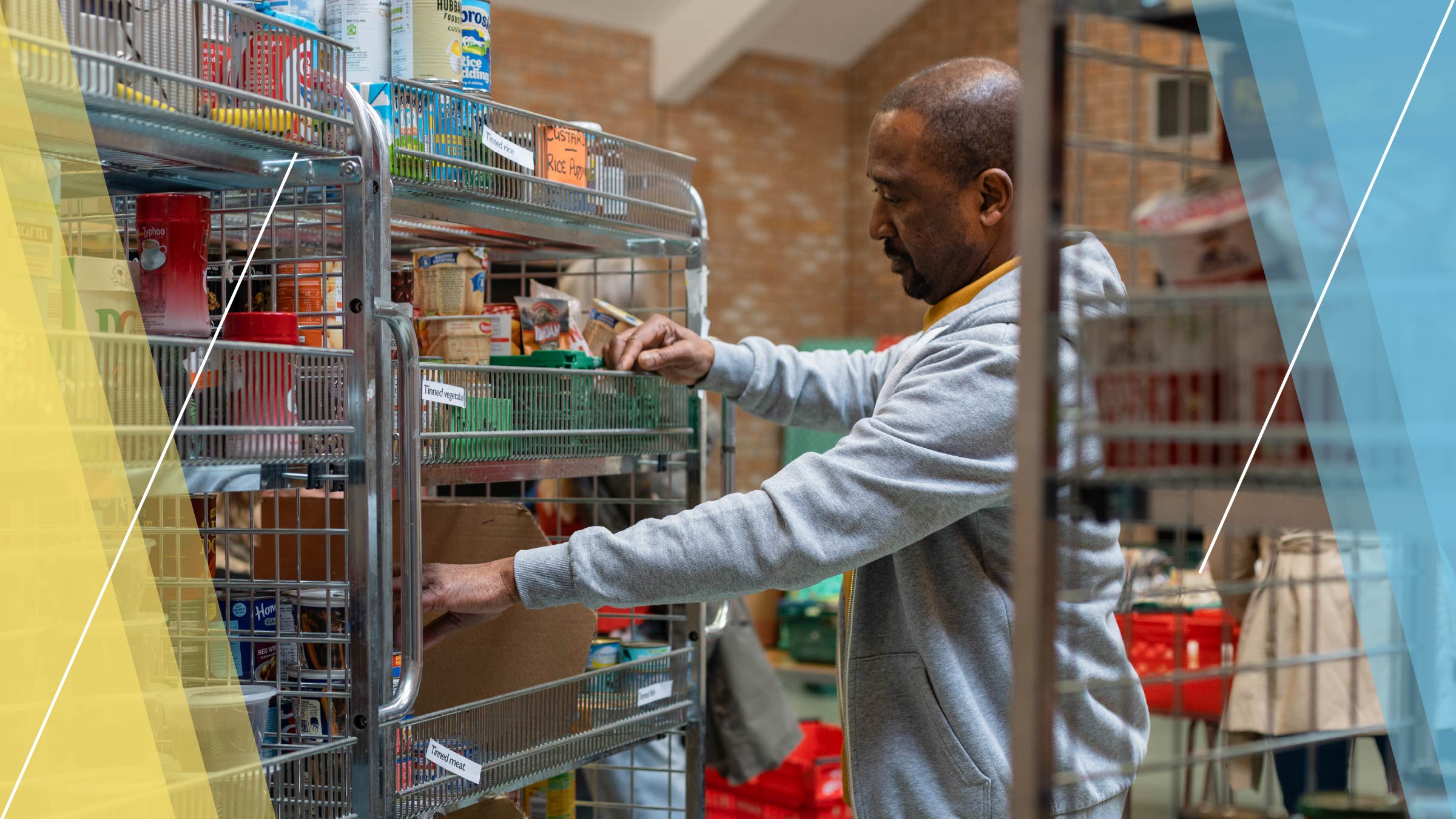 African American man stocking shelves at a food pantry