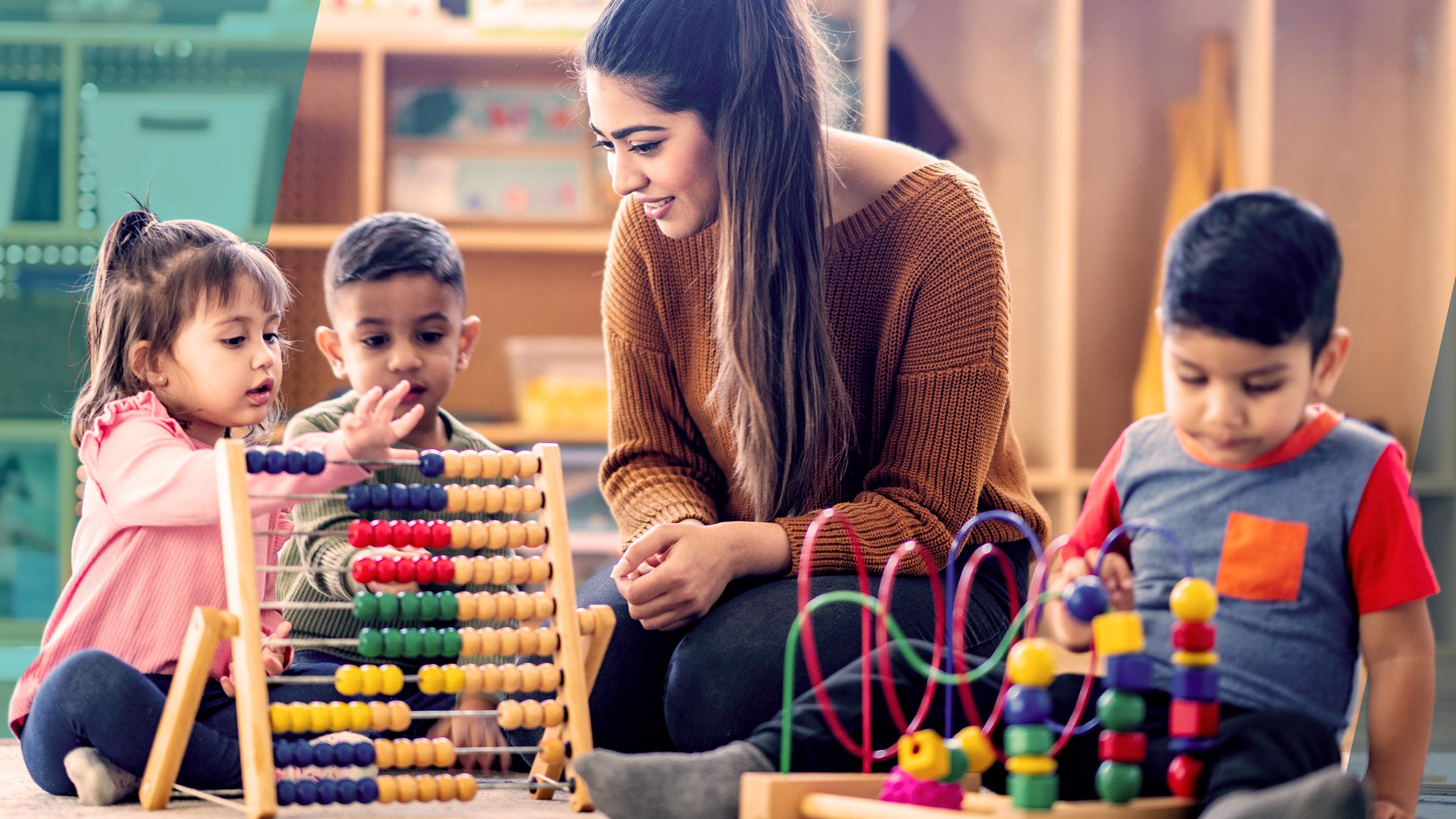 Children playing with toys with a child care worker at a child care center