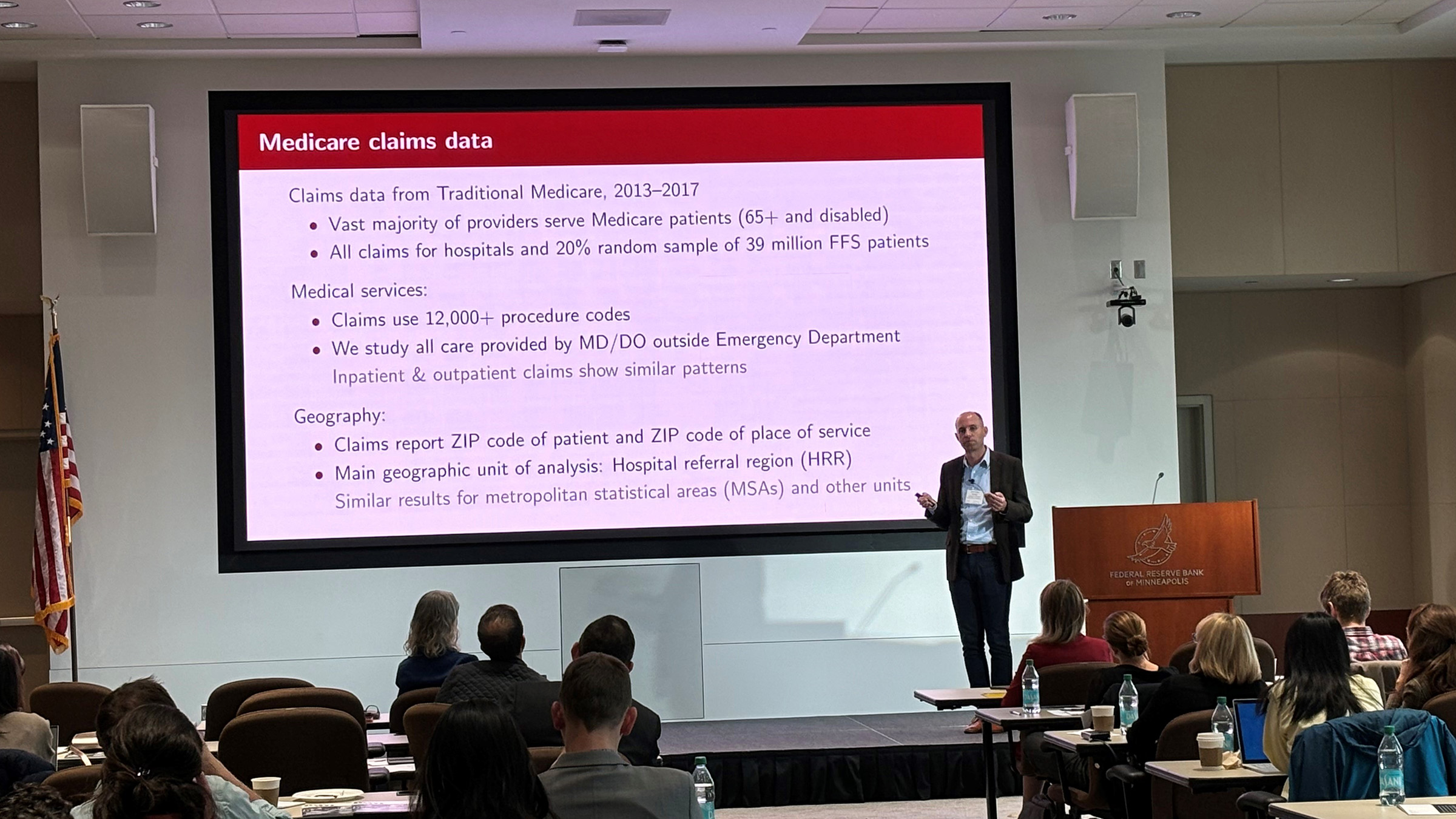 Jonathan Dingel (Chicago Booth) presents his research at the conference.
