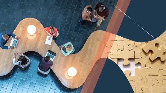 Collage image including an overhead image of workers at a table and an image of a puzzle