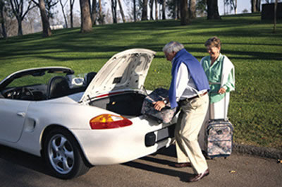 Photo: Couple packing car