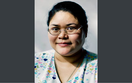 Krichaya Piamngam from Thailand is a nursing assistant at St. Therese at St. Odilia palliative care home in Shoreview, Minn.