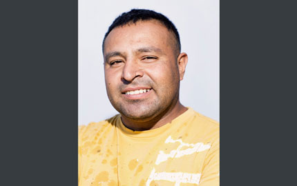 Mexican-born Miguel Martinez is employed at the Boadwine Dairy near Baltic, S.D.