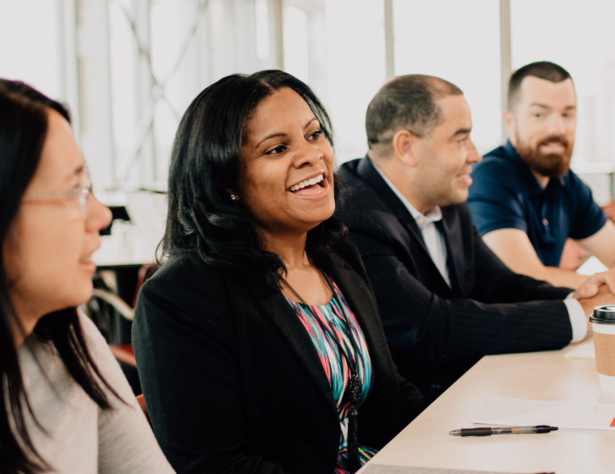 Minneapolis Fed employees collaborating in the cafeteria