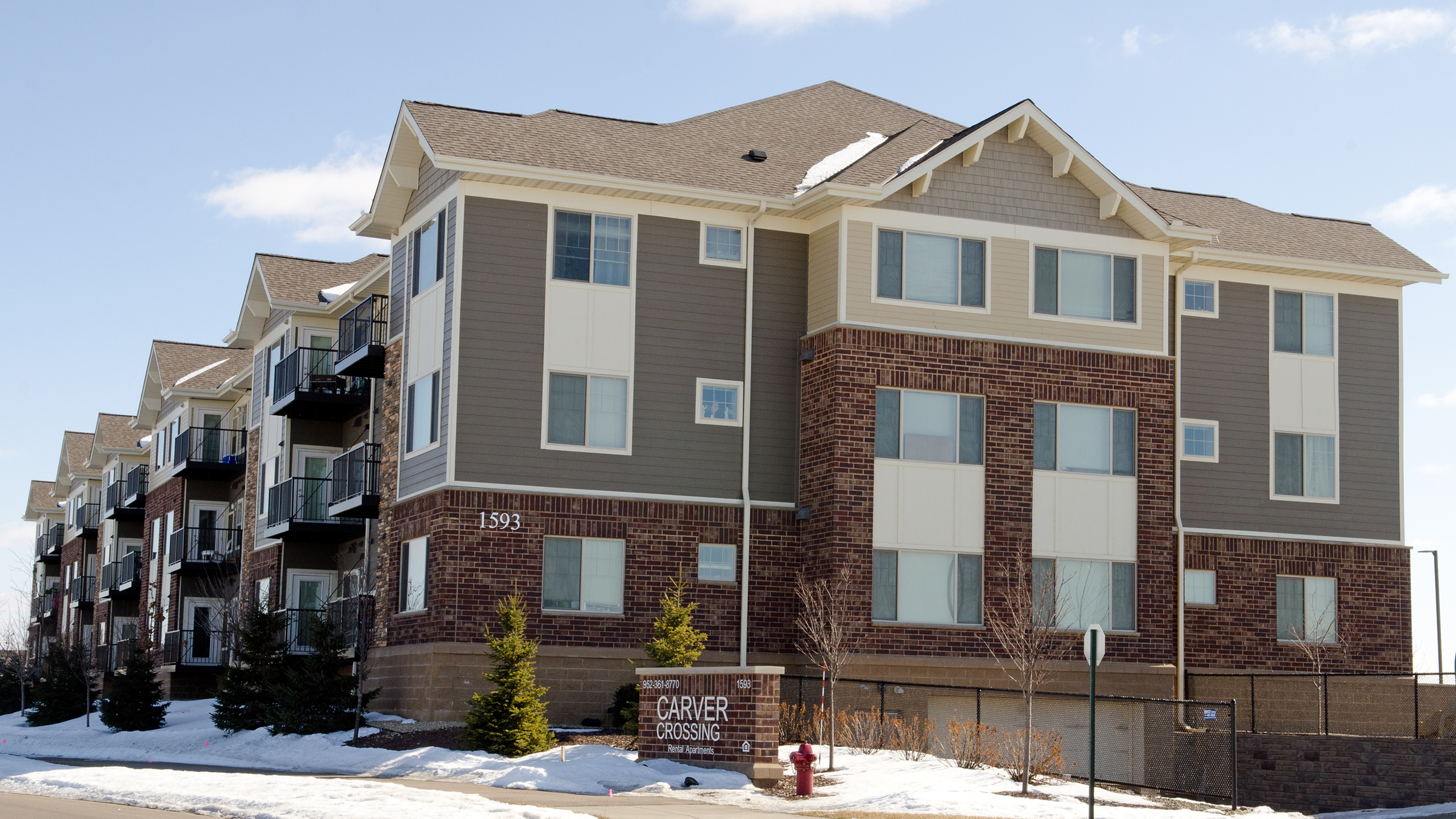 Once opposed by many neighbors, the Carver Crossing apartment complex in Carver, Minn., has become an accepted part of the community.