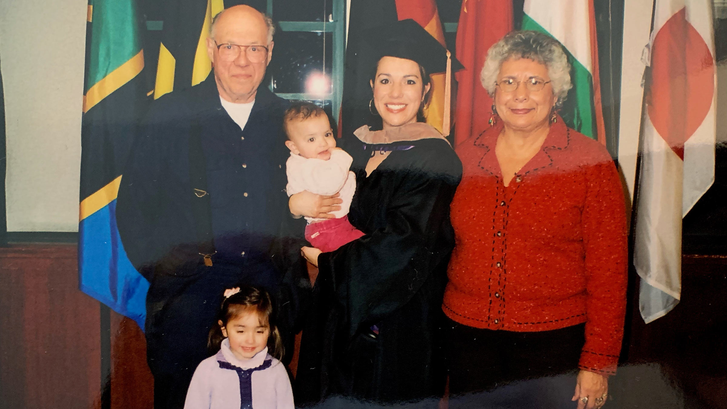 Amy’s graduation from the University of St. Thomas in fall 2004. Pictured are Joel and Carolina, Amy’s parents, and two of Amy’s children, Carmen (top center) and Sophia (bottom left).