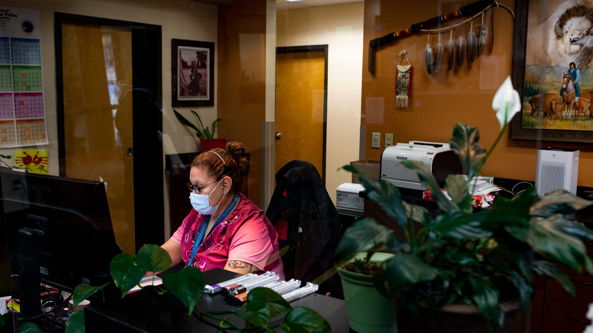 Native American woman working in an office