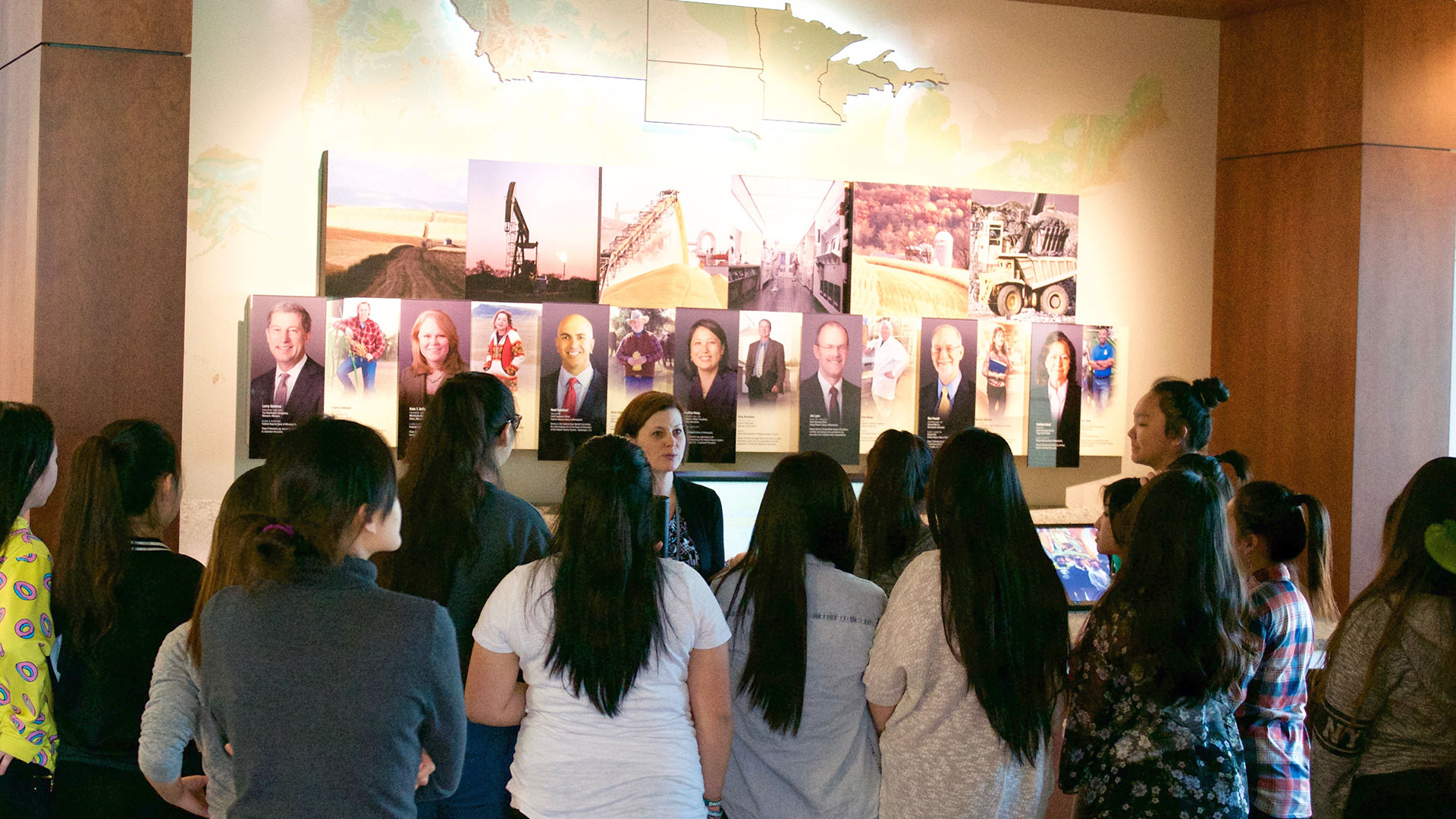 Tour guide speaking to Bank visitors